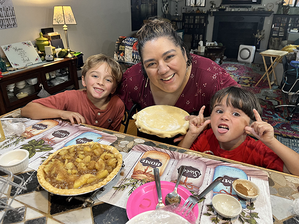 Andrea and newphews in kitchen